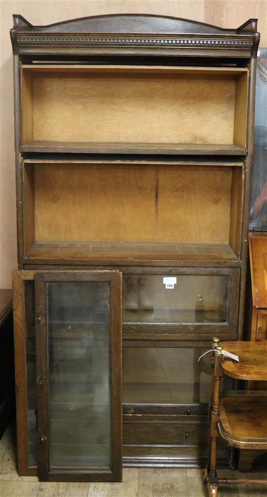 A Globe Wernicke type four section bookcase with sliding glazed doors W.89cm